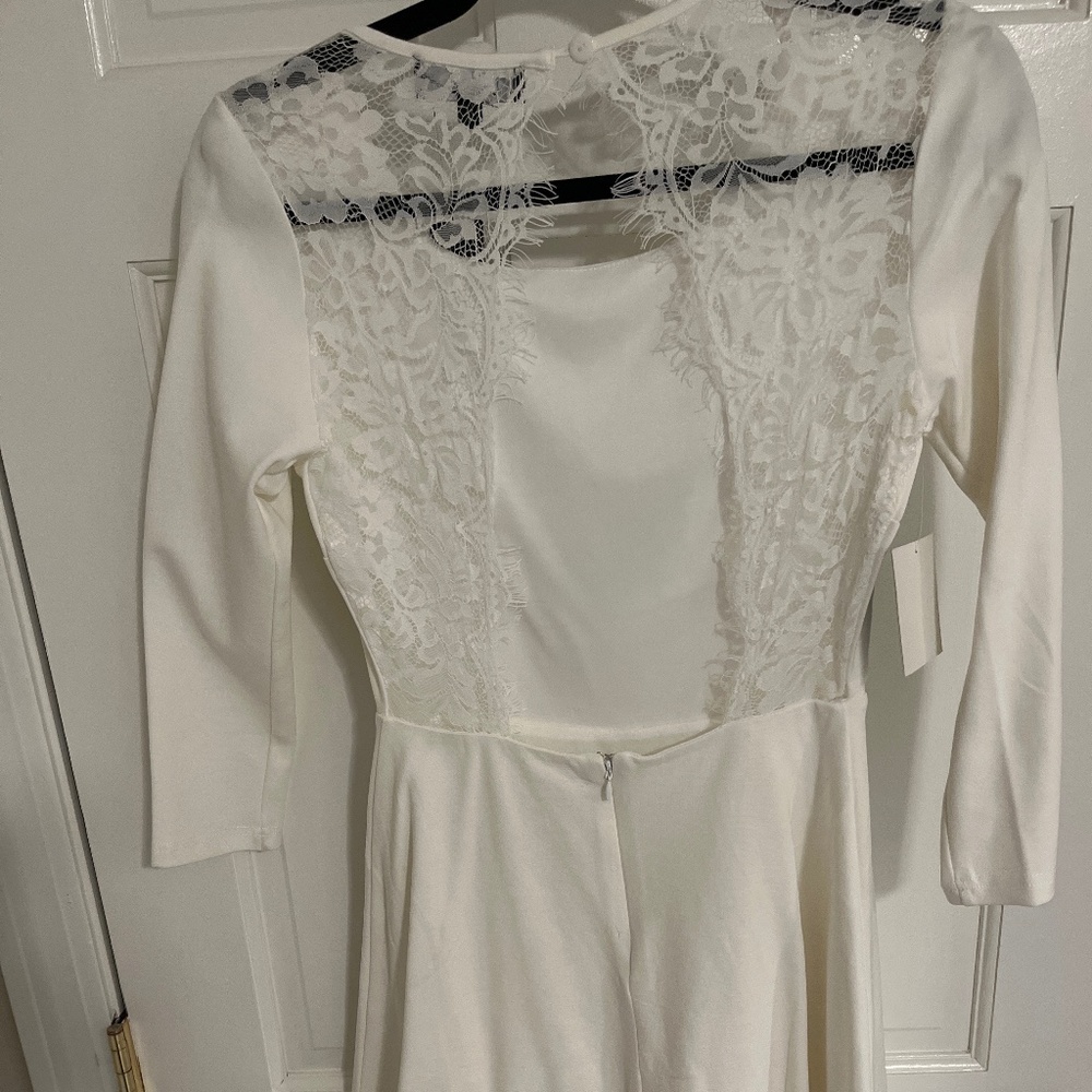 Classic white midi dress with lace back cut out